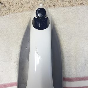 hot iron on cloth over wax stain on carpet