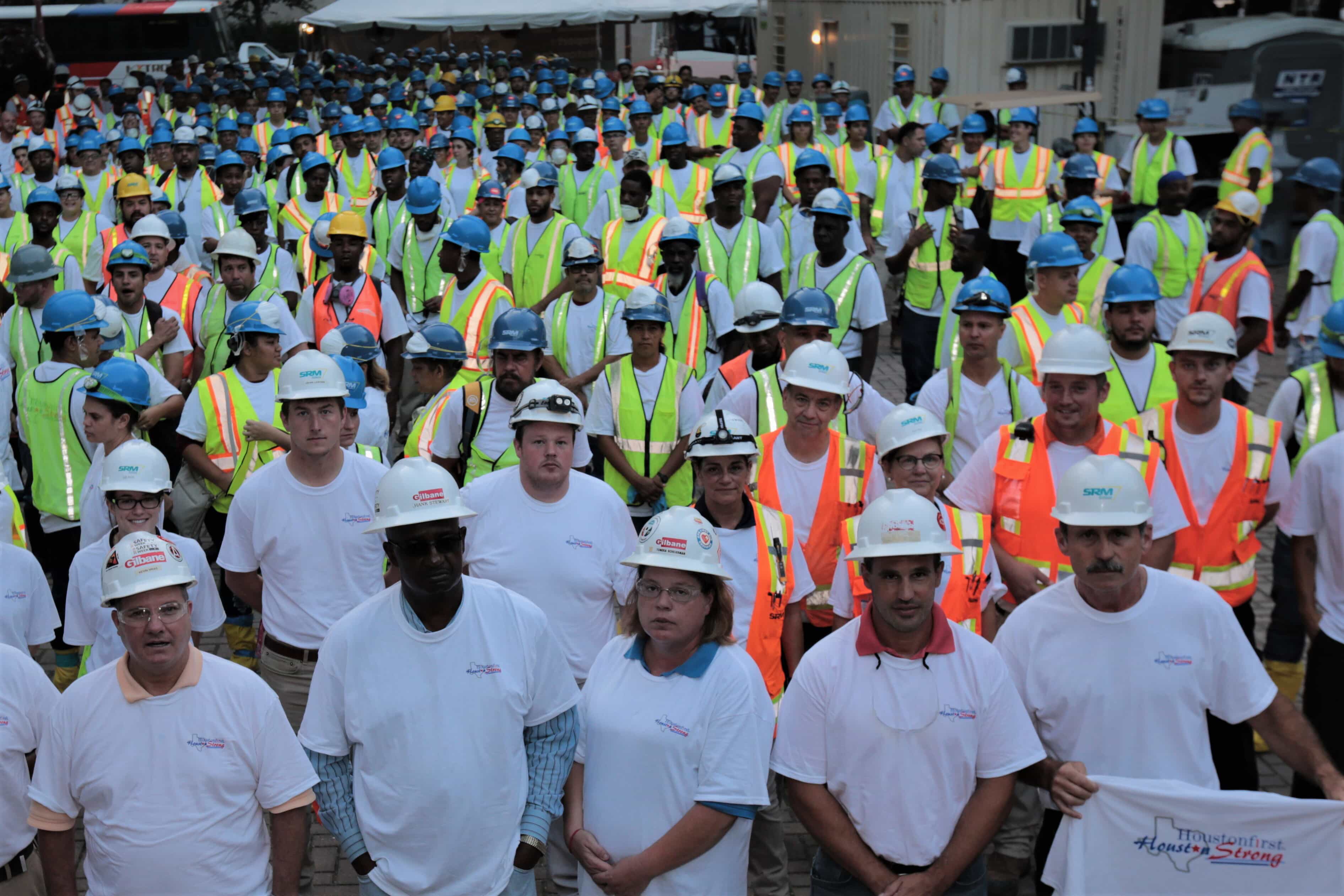 group shot of people wearing hard hats