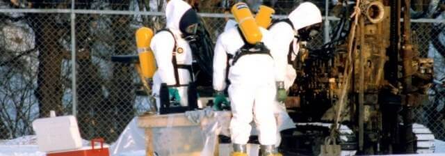 People in hazmat suits