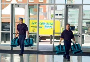 ServiceMaster technicians arriving to handle commercial water damage restoration