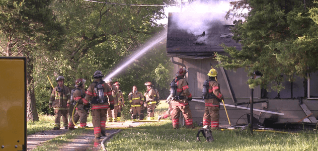 Firefighters putting out a fire