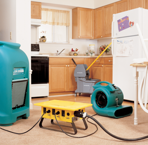 Water restoration drying machines in a kitchen